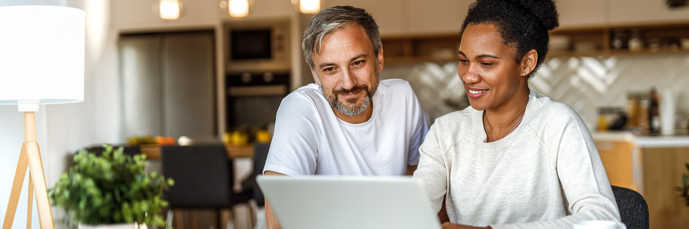 Red house in the winter covered in snow