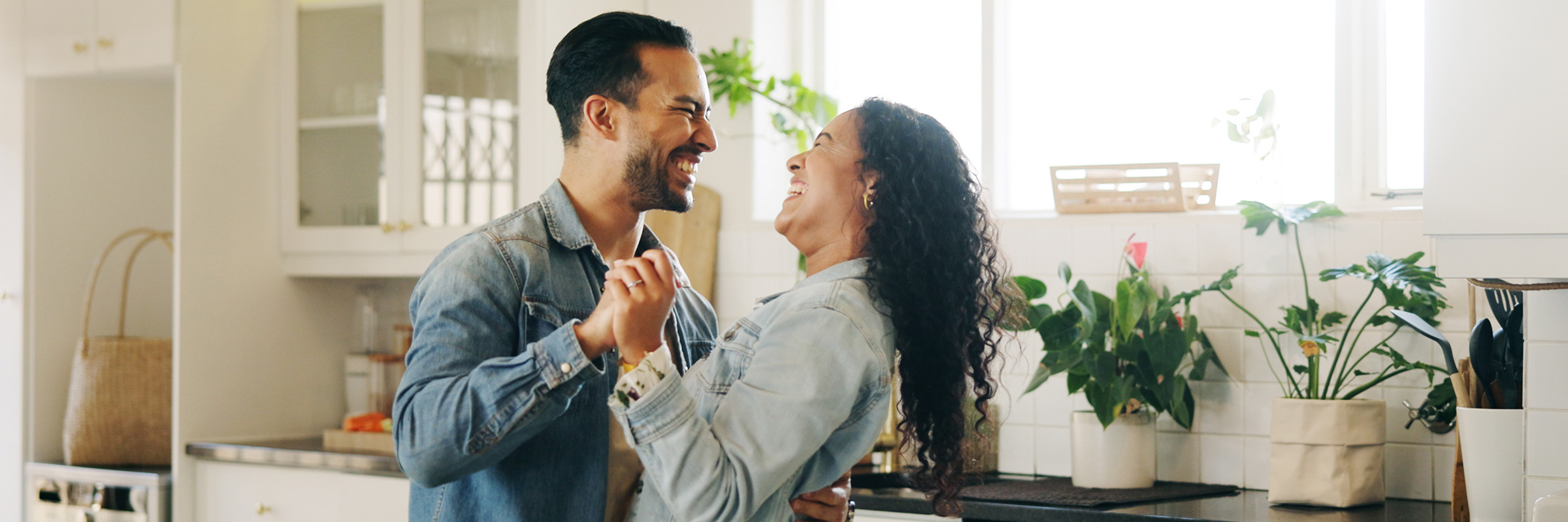 Red house in the winter covered in snow
