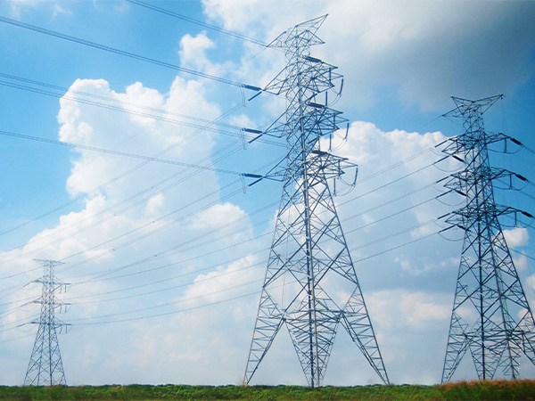 utility worker with power lines