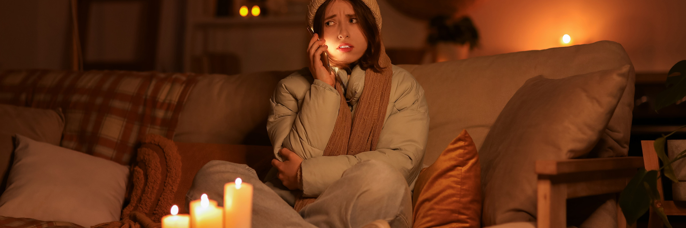 Woman on the phone in a power outage