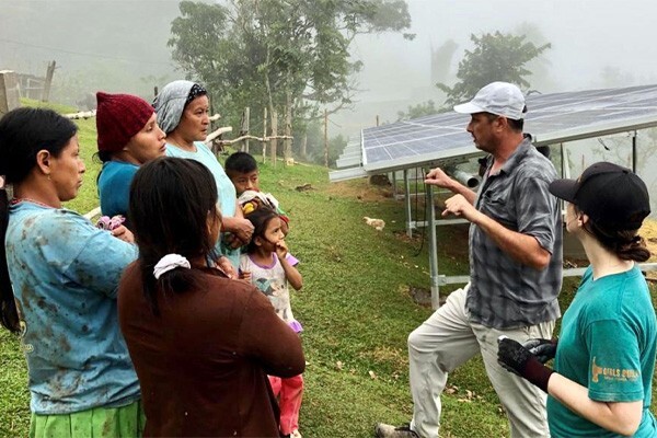 Group talking about solar panels