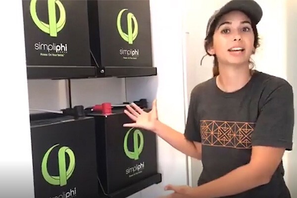 Person talking about PHI batteries