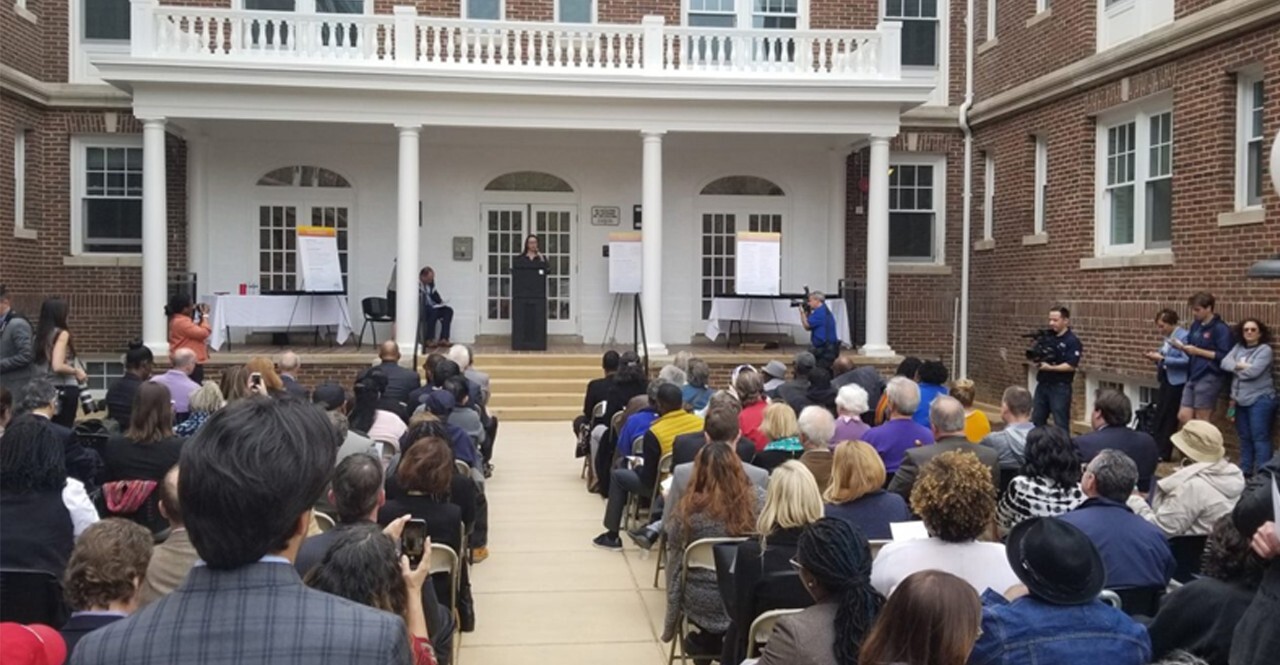 Washington DC city officials talking to a crowd
