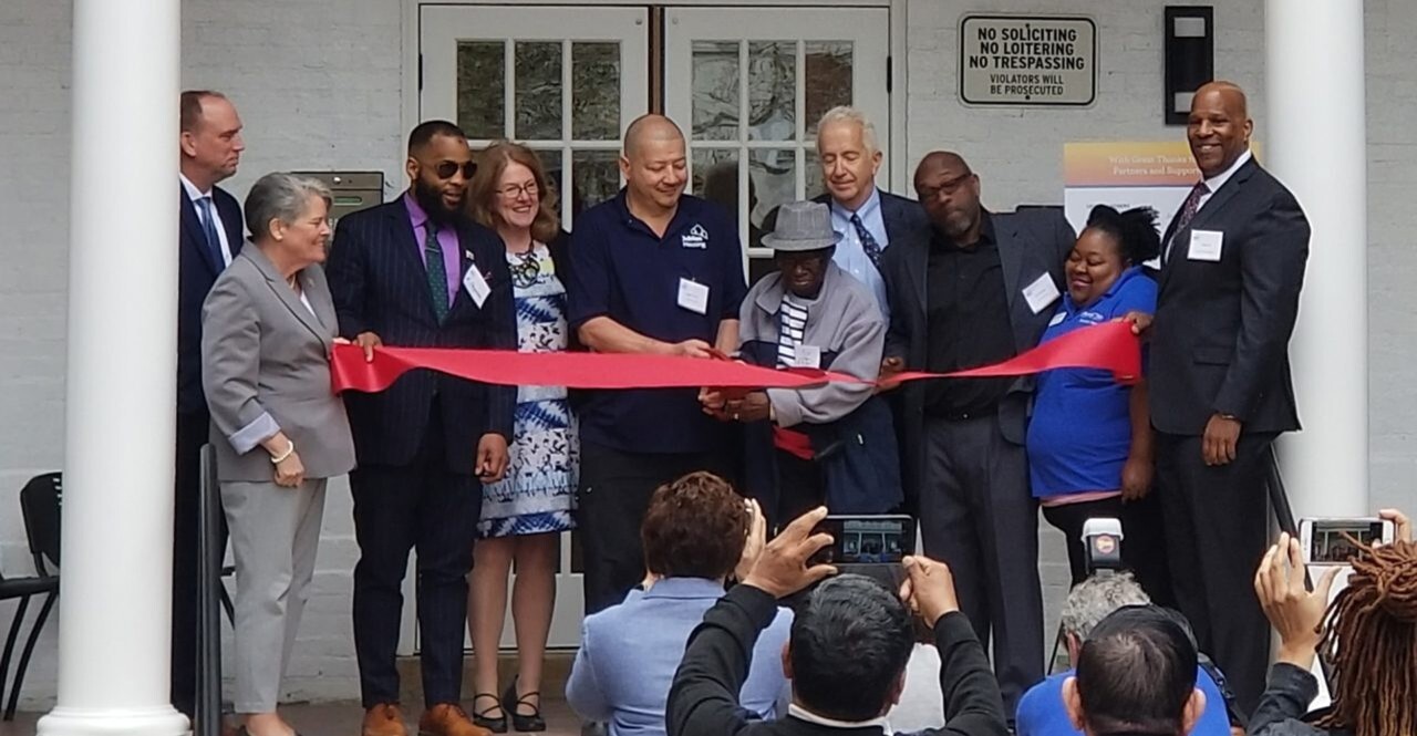 Ribbon cutting ceremony for Maycroft Apartments