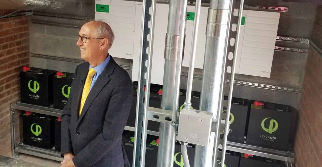 Person with PHI batteries in the battery storage system setup