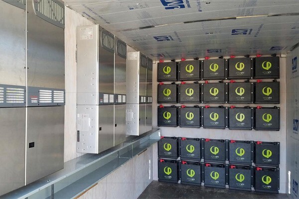 Rows of PHI batteries on a wall