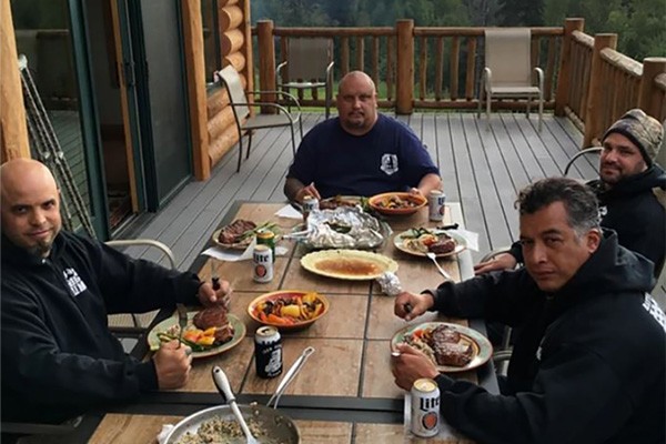 Group of veterans eating a meal